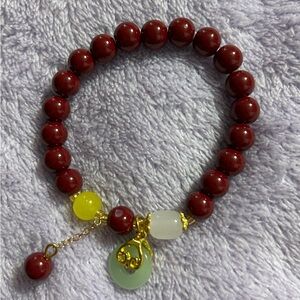 Red Beaded Bracelet with Gold Accents